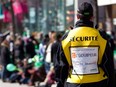 A police technology student works as extra security during the St. Patrick's parade in Montreal Sunday March 20, 2011.