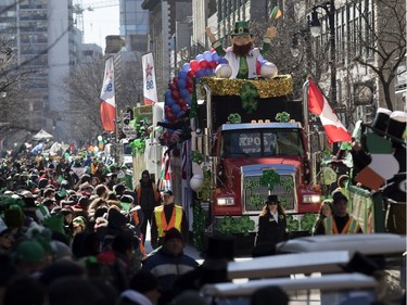An Expos leprechaun rides atop the Expos Nation float during the annual St. Patrick's Parade in Montreal on Sunday, March 20, 2016.