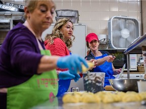 MONTREAL, QUE.: MARCH 20, 2016 -- Event organizer Eve Rochman right, speaks with  volunteers Anat Lazar, centre, and Carol Koffler, left, as they prepare hamantaschen for the Jewish holiday of Purim, which this year begins Wednesday at sundown, at Congregation Shaar Hashomayim in Westmount on Sunday, March 20, 2016.  All the proceeds of sales of the hamantaschen go to the organization Save a Child's Heart. (Dario Ayala / Montreal Gazette)