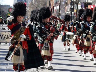 Members of the RCMP Pipe and Drums Band take part in the annual St. Patrick's Parade in Montreal on Sunday, March 20, 2016.