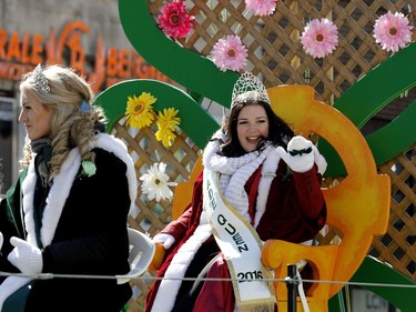 Parade queen Sarah Cambridge waves to the crowd during the annual St. Patrick's Parade in Montreal on Sunday, March 20, 2016.