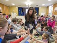 Singer and songwriter Brittany Kennell, former student at St. Paul Elementary School in Beaconsfield greets students at the school during a visit, Thursday March 24, 2016.  She is currently competing on the NBC singing contest, The Voice.  (Phil Carpenter / MONTREAL GAZETTE)