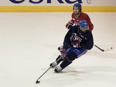 Canadiens defenceman P.K. Subban is followed by Montreal Canadiens centre David Desharnais through a drill during a team practice at the Bell Sports Complex in Montreal on Friday March 25, 2016.