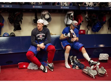 Canadiens' Michael McCarron, left, and Jacob De La Rose take a moment to rest after a team practice at the Bell Sports Complex in Montreal on Friday March 25, 2016.