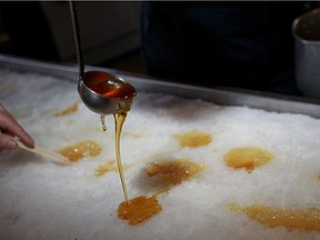 Canadian maple syrup taffy poured on the snow.