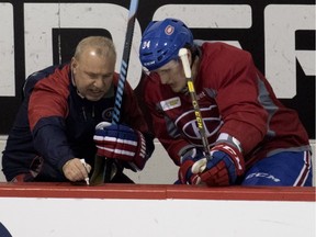 Canadiens winger Michael McCarron, with head coach Michel Therrien at March 16 practice, figures to be among players fighting for jobs on Habs' third and fourth lines next season.