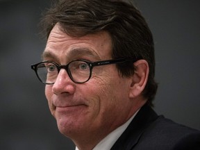 Parti Quebecois leader Pierre Karl Péladeau smiles as he listens to a question from students during an event organized for sovereignty week at the Universite de Montreal  Monday, March 7, 2016.