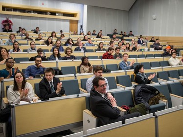 Parti Quebecois leader Pierre Karl Péladeau, front, smiles as he is introduced to students during an event organized for sovereignty week at the Universite de Montreal  March 7, 2016.
