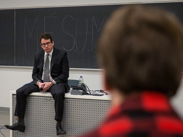 Parti Quebecois leader Pierre Karl Péladeau looks on as he listens to a question from a student during an event organized for sovereignty week at the Universite de Montreal in Montreal on Monday, March 7, 2016.