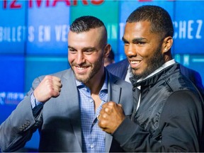 Boxers David Lemieux, left, and James De La Rosa, right, pose for the cameras during a pre-fight press conference at the Montreal Casino in Montreal on Wednesday, March 9, 2016.