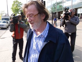 Martial Fillion leaves Surete du Quebec headquarters in Montreal on May 17, 2012 after he'd been arrested by Quebec's anti-corruption squad.