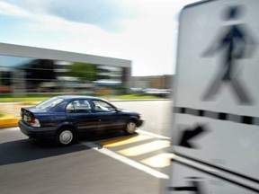 A car zooms past a cross walk on Jules-Poitras street in Montreal Wednesday June 19, 2002, at a designated crosswalk without slowing down. If you see (or cause) an accident – especially if a pedestrian is involved – it's your duty to help.