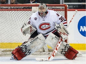 Charlie Lindgren, who signed with the Canadiens yesterday, posted a 30-9-1 record with a 2.13 goals-against average, a .925 save percentage and five shutouts this season with St. Cloud State University. 
credit: Brace Hemmelgarn/SCSU hockey