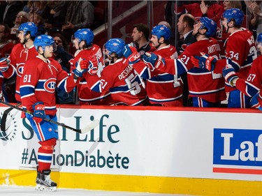 Canadiens' Lars Eller celebrates his goal with teammates on the bench during the NHL game against the New York Rangers at the Bell Centre on March 26, 2016, in Montreal.