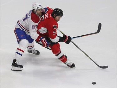 The Ottawa Senators took on the Montreal Canadiens at the Canadian Tire Centre in Ottawa Ontario Saturday March 19, 2016.  Senators Cody Ceci tries to get away from Canadien Max Pacioretty during first period action.
