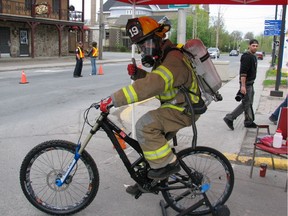 Steve Laviolette pedals his mountain bike on a treadmill for 12 hours straight in preparation for the 2009 World Police and Fire Games.