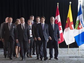 Prime Minister Justin Trudeau leads Canada's premiers to a news conference during the First Ministers Meeting in Vancouver, B.C., Thursday, March. 3, 2016.