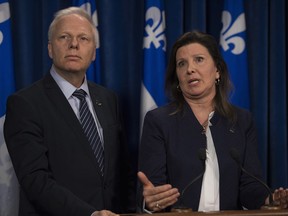 Parti Québécois MNAs Jean-François Lisée and Diane Lamarre respond to reporters' questions on health, Wednesday, March 9, 201'6 at the legislature in Quebec City.