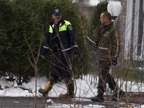 NOV. 24, 2011: Police at the scene where Salvatore Montagna was killed near Charlemagne.
