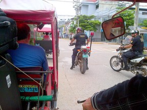 Amid the mounting intensity of a general strike, Terry O'Shaughnessy and her fellow volunteers received a police escort to the airport after completing their humanitarian project in Pucallpa, Peru.