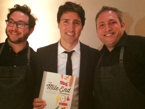 Joel Tietolman, right, and business partner Noah Bernamoff, left, met Prime Minister Justin Trudeau on Wednesday. The owners of Mile End Deli and Black Seed in New York were part of a welcome reception for the prime minister in Washington.