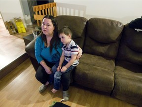 Annie Vollant with her grandson, 3-year-old Jake Vollant Picard in her Uashat home on Dec. 2, 2015.  She is one of several in the Innu community of Uashat-Maliotenam who have lost family members to suicide.