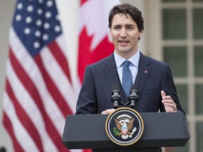 Canadian Prime Minister Justin Trudeau speaks during a press conference with  US President Barack Obama in the Rose Garden of the White House in Washington, DC, March 10, 2016.