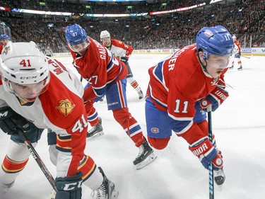 Brendan Gallagher, right, and Alex Galchenyuk compete with the Panthers' Greg McKegg, during second period in Montreal on Tuesday, April 5, 2016.