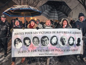 Lillian Villanueva, centre, leads a demonstration in Montreal North Wednesday, April 6, 2016, to protest against the killing of Bony Jean-Pierre by Montreal Police last week during a drug raid.  Lillian Villanueva is the mother of Fredy Villanueva, who was shot and killed by police in 2008.