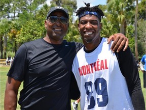 Alouettes receiver Duron Carter with his father Cris, a Pro Football Hall of Famer, at Day 2 of Alouettes mini-camp in West Palm Beach, Fla., on Thursday, April 18, 2016.