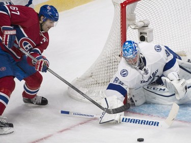 Montreal Canadiens captain Max Pacioretty moves in on Tampa Bay Lightning's goaltender Andrei Vasilevskiy during third period NHL hockey action in Montreal, Saturday, April 9, 2016.