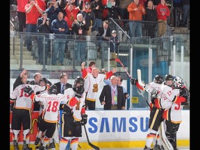 Saint John Vito's players celebrate their 2-1 semifinal win over  the Lac St-Louis Lions on Saturday, April 23, 2016, in the 2016 Telus Cup.