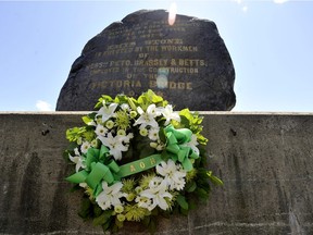 A wreath sits at the base of the black rock in Point Saint Charles, Montreal, Sunday, May 31, 2009, after a ceremony to commemorate the Irish immigrants who died of typhus in Montreal after fleeing the potato famine in 1847. photo  THE GAZETTE/Graham Hughes.