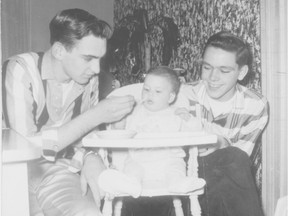 Brotherly love: Baby Kathy with her big brothers, John, left, and Paul. She was born at St. Mary’s Hospital in 1957 and adopted into the Reynolds family in 1958.