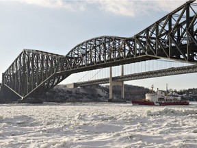 "This is not just a matter of painting the (Quebec) bridge. But also to ensure for environmental reasons that no old paint falls into the St. Lawrence," Federal Minister of Transport, Marc Garneau says.