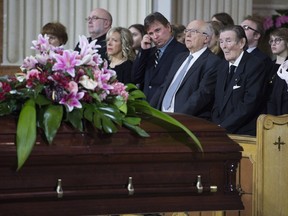 Family members of Claire Kirkland-Casgrain   attend her funeral at Mary Queen of the World Cathedral in Montreal, Saturday, April 2, 2016.