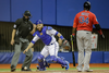 Toronto Blue Jays catcher Russell Martin, centre, drops a ball as Boston Red Sox designated hitter David Ortiz, right, is at bat during the fifth inning of their exhibition game at the Olympic Stadium in Montreal on Friday, April 1, 2016.