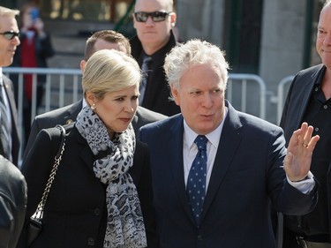Former Quebec Premier Jean Charest, right, and his wife Michele Dionne, left, arrive for the second funeral of former MP and media personality Jean Lapierre and his wife Nicole Beaulieu at Saint-Viateur-d'Outremont church in Montrealon Saturday, April 16, 2016. The couple died on March 29 in an airplane crash along with Lapierre’s siblings Louis Lapierre, Marc Lapierre, and Martine Lapierre as well as pilots Pascal Gosselin and Fabrice Labourel. The group was heading to Les Iles-de-la-Madeleine for the funeral of their father Raymond Lapierre.