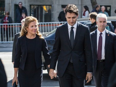 Prime Minister of Canada Justin Trudeau, right, and his wife Sophie Gregoire-Trudeau, left, arrive for the second funeral of former MP and media personality Jean Lapierre and his wife Nicole Beaulieu at Saint-Viateur-d'Outremont church in Montrealon Saturday, April 16, 2016. The couple died on March 29 in an airplane crash along with Lapierre’s siblings Louis Lapierre, Marc Lapierre, and Martine Lapierre as well as pilots Pascal Gosselin and Fabrice Labourel. The group was heading to Les Iles-de-la-Madeleine for the funeral of their father Raymond Lapierre.