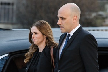 Jean Lapierre's daughter Marie-Anne Lapierre, left, and her spouse Mathieu Belhumeur, right, arrive for the second funeral of former MP and media personality Jean Lapierre and his wife Nicole Beaulieu at Saint-Viateur-d'Outremont church in Montrealon Saturday, April 16, 2016. The couple died on March 29 in an airplane crash along with Lapierre’s siblings Louis Lapierre, Marc Lapierre, and Martine Lapierre as well as pilots Pascal Gosselin and Fabrice Labourel. The group was heading to Les Iles-de-la-Madeleine for the funeral of their father Raymond Lapierre.
