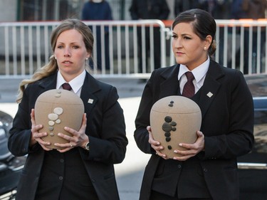 Urns containing the remains of former MP and media personality Jean Lapierre and his wife Nicole Beaulieu arrive for their funeral at Saint-Viateur-d'Outremont church in Montrealon Saturday, April 16, 2016. The couple died on March 29 in an airplane crash along with Lapierre’s siblings Louis Lapierre, Marc Lapierre, and Martine Lapierre as well as pilots Pascal Gosselin and Fabrice Labourel. The group was heading to Les Iles-de-la-Madeleine for the funeral of their father Raymond Lapierre.