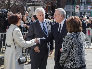 Former Bloc Quebecois leader Gilles Duceppe, second from left, and his wife Yolande Brunelle, left, greet former Canadian Prime Minister Paul Martin, second form right, and his wife Sheila Martin, right, as they arrive for the second funeral of former MP and media personality Jean Lapierre and his wife Nicole Beaulieu at Saint-Viateur-d'Outremont church in Montrealon Saturday, April 16, 2016. The couple died on March 29 in an airplane crash along with Lapierre’s siblings Louis Lapierre, Marc Lapierre, and Martine Lapierre as well as pilots Pascal Gosselin and Fabrice Labourel. The group was heading to Les Iles-de-la-Madeleine for the funeral of their father Raymond Lapierre.