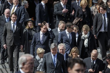 Polititian leave the funeral service of former MP and media personality Jean Lapierre and his wife Nicole Beaulieu at Saint-Viateur-d'Outremont church in Montrealon Saturday, April 16, 2016. The couple died on March 29 in an airplane crash along with Lapierre’s siblings Louis Lapierre, Marc Lapierre, and Martine Lapierre as well as pilots Pascal Gosselin and Fabrice Labourel. The group was heading to Les Iles-de-la-Madeleine for the funeral of their father Raymond Lapierre.