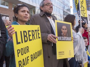 Ensaf Haidar, left, wife of blogger Raif Badawi, takes part in a rally for his freedom Thursday, April 21, 2016 in Montreal.