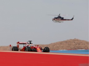 Sebastian Vettel of Germany steers his Ferrari during practice in Bahrain.