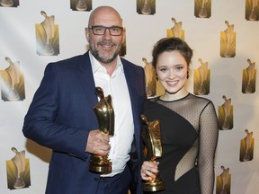 Sylvain Marcel and Marianne Fortier hold up their trophies for best actor and actress in a television series at the Gala Artis awards ceremony in Montreal, Sunday, April 24, 2016.