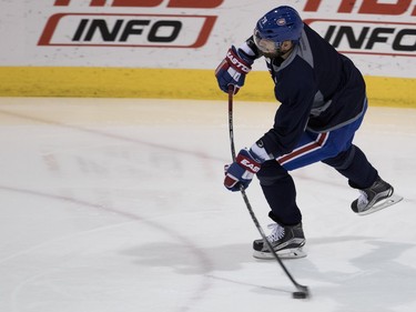 Defenseman Andrei Markov gets some stick flex as he takes a shot during a team practice at the Bell Sports Complex in Montreal on Monday, April 4, 2016.