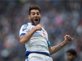 Montreal Impact's Ignacio Piatti celebrates his goal against the Vancouver Whitecaps during first half MLS soccer action, in Vancouver on Sunday, Mar. 6, 2016.