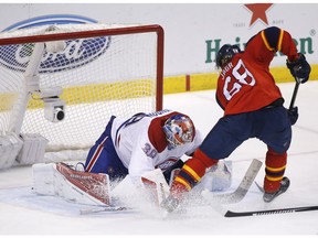 Florida Panthers right wing Jaromir Jagr shoots against Montreal Canadiens goalie Mike Condon during the third period of an NHL hockey game, Saturday, April 2, 2016, in Sunrise, Fla.