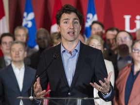 Prime Minister Justin Trudeau speaks to reporters during the 2016 Biennial Convention of the Quebec wing of the Liberal Party of Canada in Montreal, Saturday, April 30, 2016.